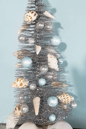 coastal christmas tree created using cheap and affordable seashells and ocean creatures