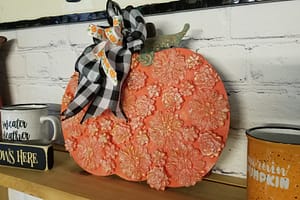 Make an easy DIY Dollar Tree farmhouse pumpkin!
