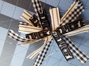easy bow using dollar tree ribbon and a little bit of wire